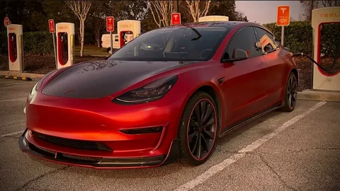 Red Tesla Model 3 Compared to Other Electric Cars